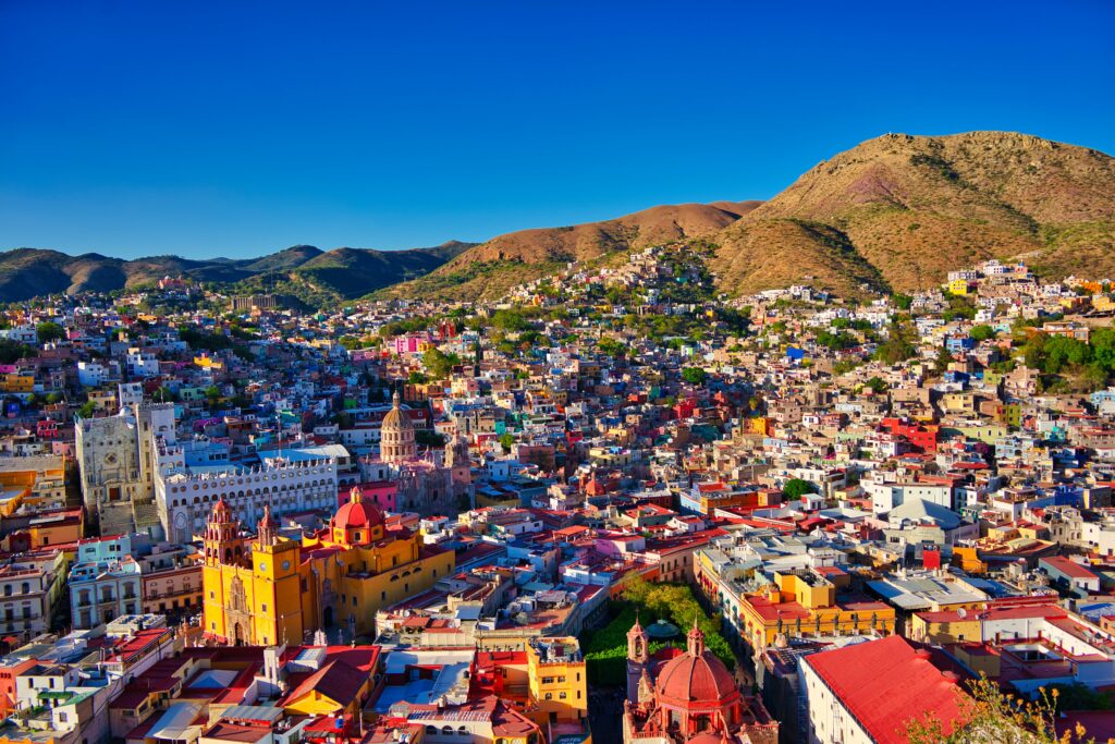 Colourful buildings covering steep hillsides in Guanajuato, Mexico.