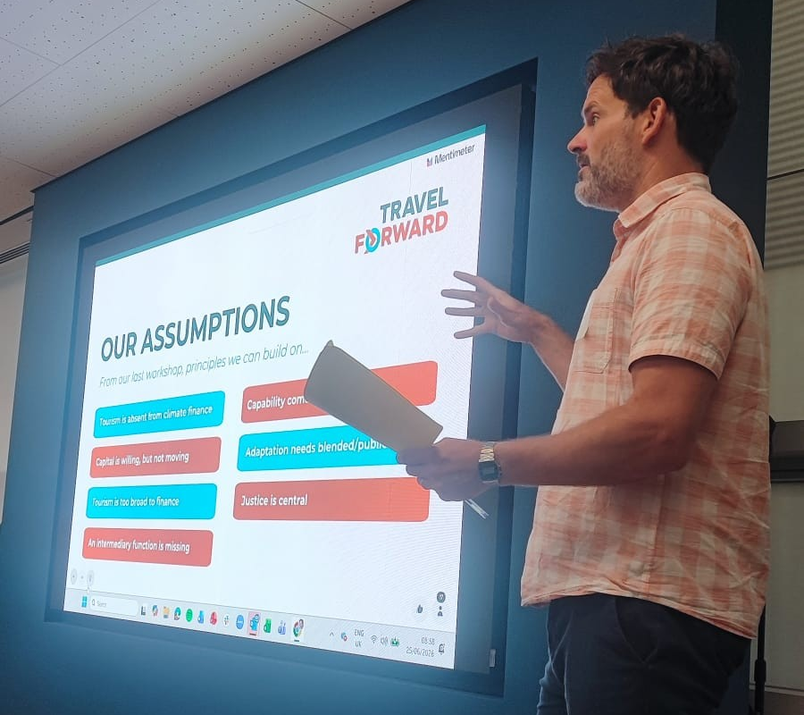 Travel Forward's Ben Lynam presenting at a climate finance roundtable during London Climate Action Week 2026.